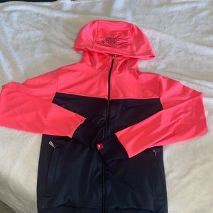 Nike neon pink and navy blue hooded jacket. Size children’s L but fits women’s S